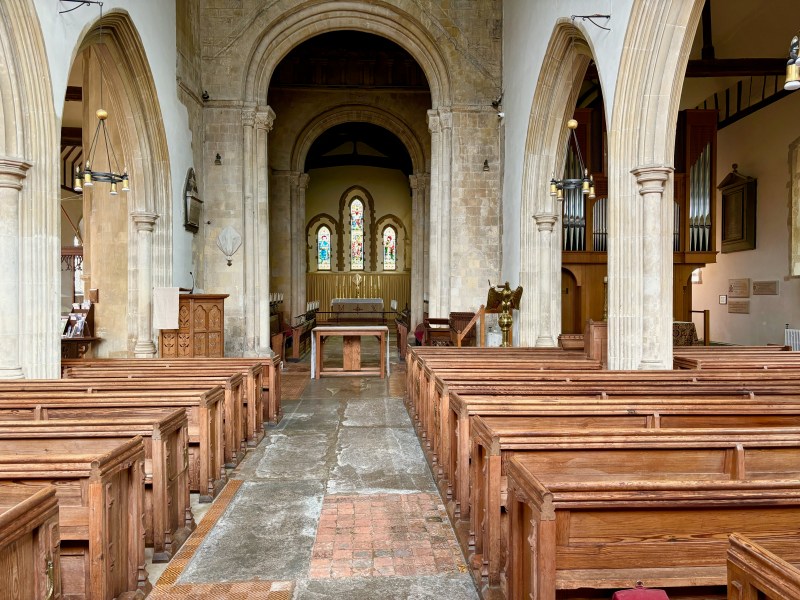 A church featuring pews and an alter at the front