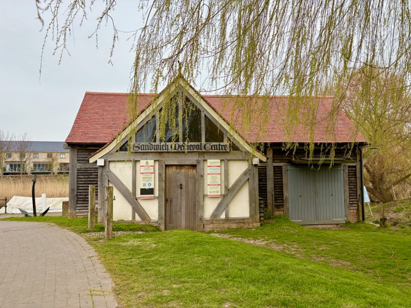 An old looking building alongside the River Stour in Sandwich