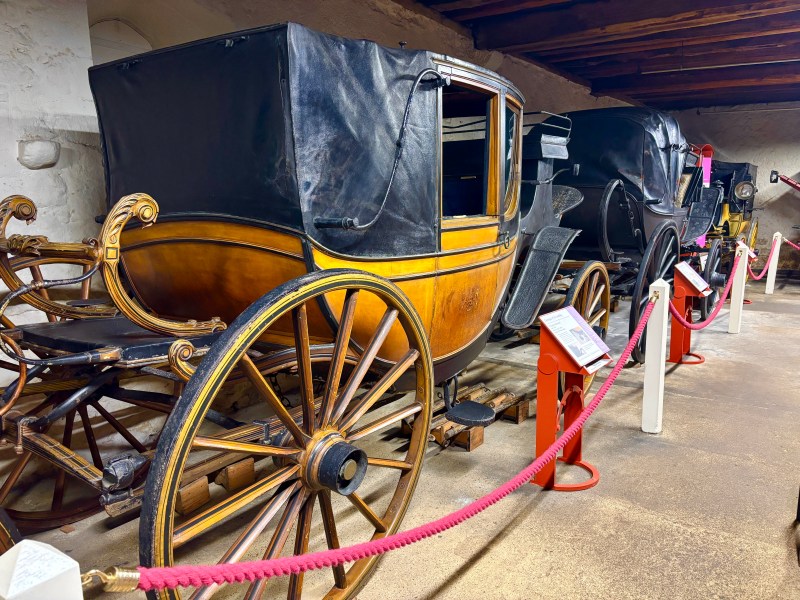 Tyrwhitt-Drake Carriage Museum featuring a yellow carriage